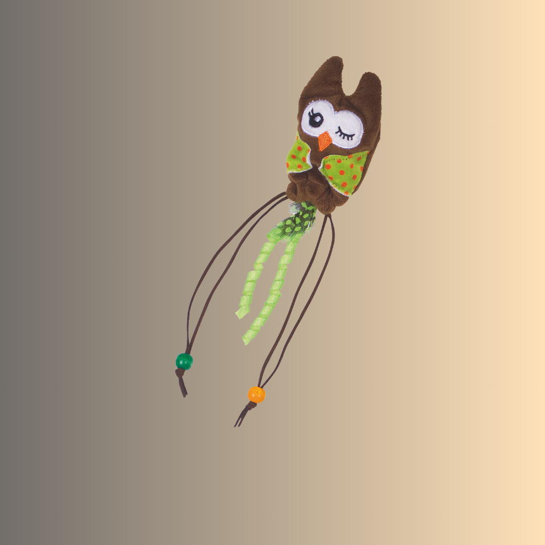 Chouette en peluche avec balle en bois